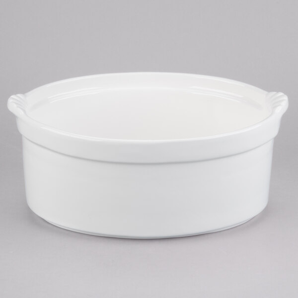 A white ceramic Tablecraft casserole dish with a handle.