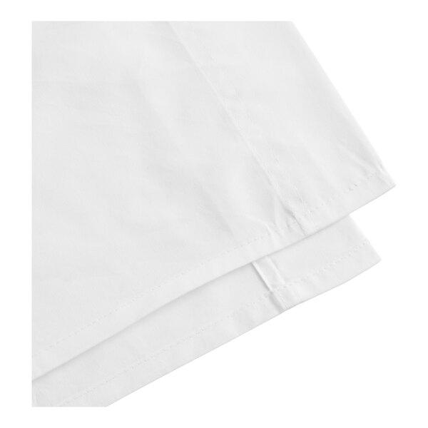A white cotton and polyester flat sheet in an extra-large queen size.