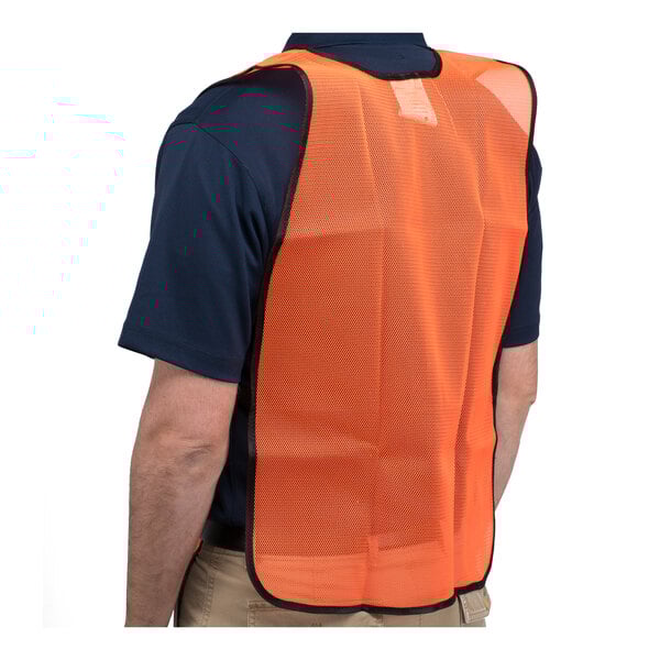 A person wearing a Cordova orange high visibility safety vest with black accents.