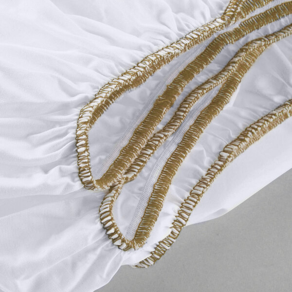 A white Oxford T200 Superblend king size fitted sheet with gold stitching.