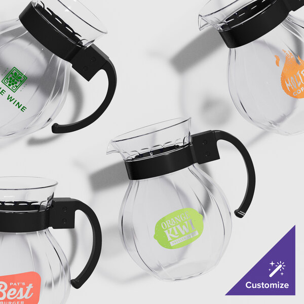 A clear plastic pitcher with a black handle and customizable labels.