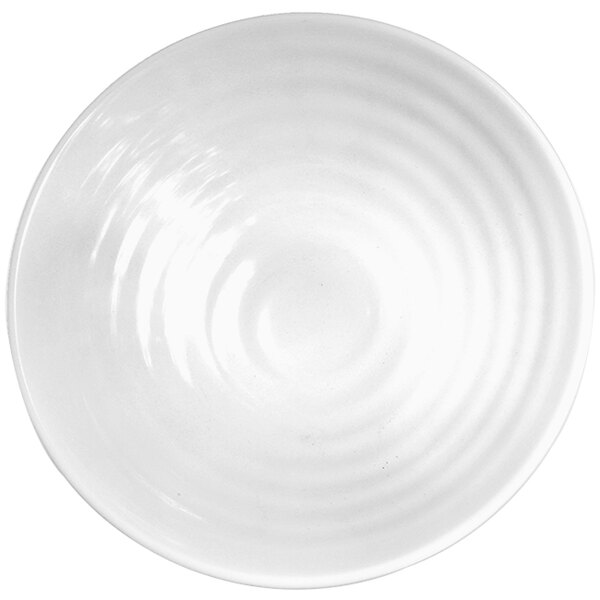 A white Elite Global Solutions melamine bowl with a spiral pattern.