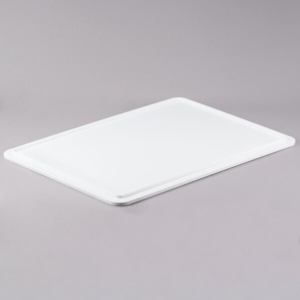An American Metalcraft ABS plastic cover on a white rectangular dough box.