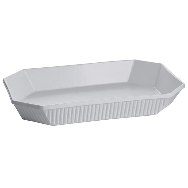 A natural cast aluminum octagon casserole dish with a lid.