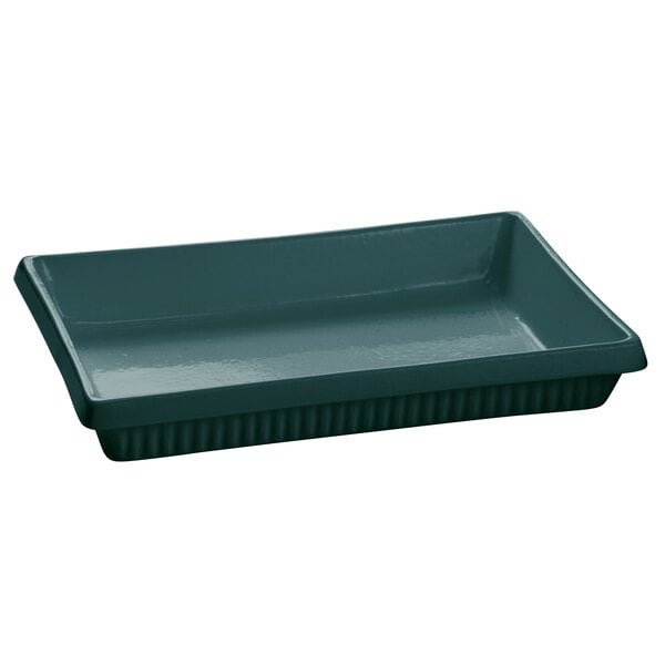 A rectangular hunter green cast aluminum casserole dish with a black handle.