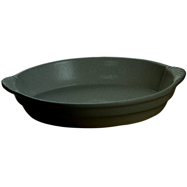 A black oval Tablecraft cast aluminum casserole dish with green speckles and handles.