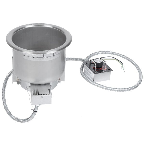 A close up of a silver Hatco drop-in heated soup well with a drain.