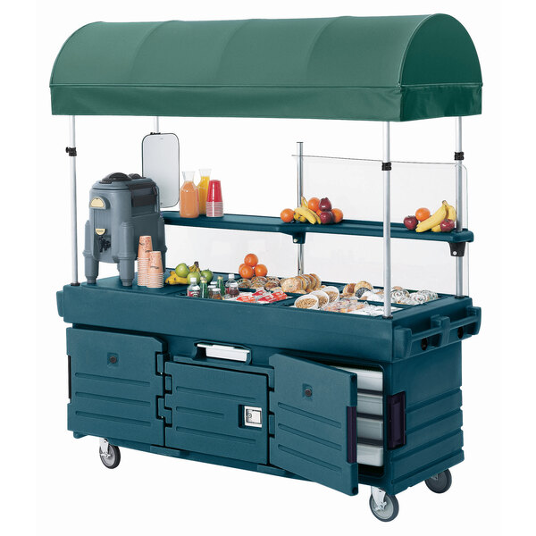 A green Cambro canopy on a CamKiosk cart.