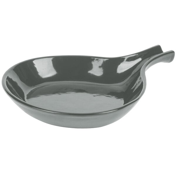 A grey cast aluminum skillet with an open handle.
