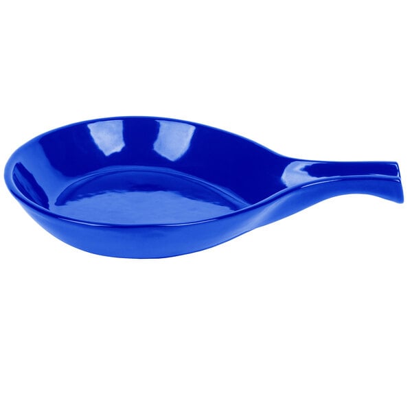A cobalt blue cast aluminum skillet with an open handle.