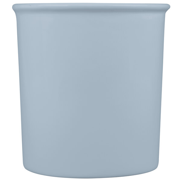 A gray cast aluminum bowl with a lid.