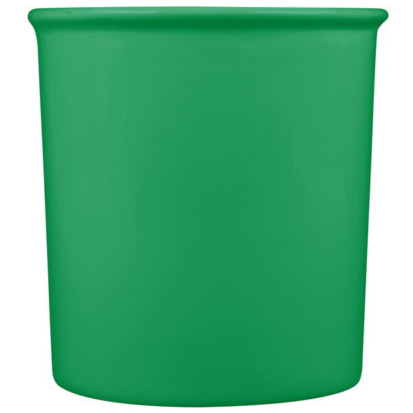 A green cast aluminum salad dressing bowl with a lid.