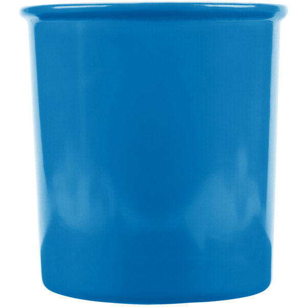 A blue cast aluminum salad dressing bowl with a lid.