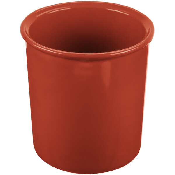 A copper cast aluminum salad dressing bowl with a white background.