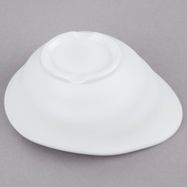 A white Tablecraft Melamine Bowl on a gray surface.