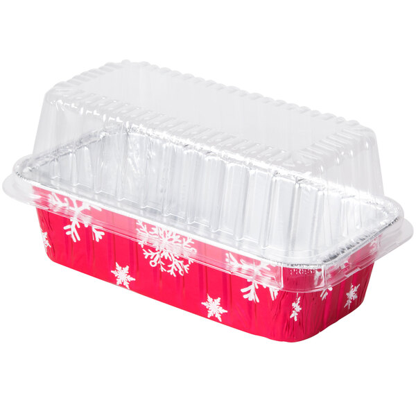 A red and white Durable Packaging holiday foil loaf pan with a clear lid.