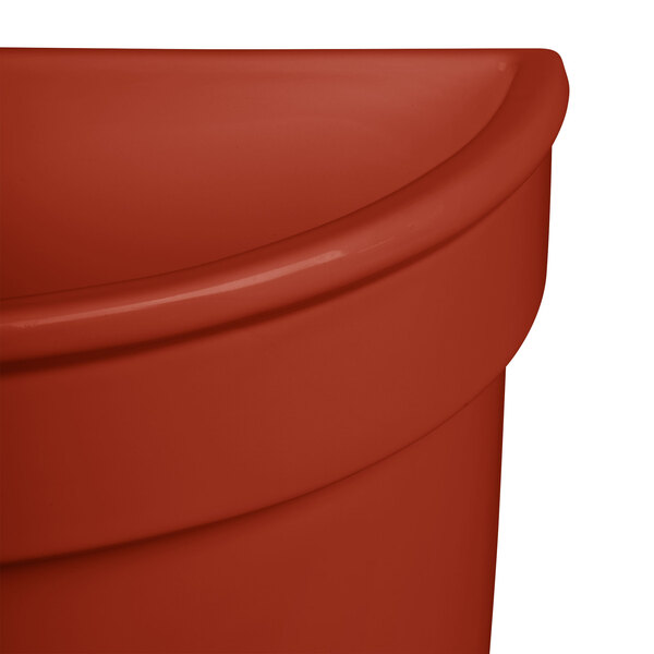 A Tablecraft copper cast aluminum half soup bowl with a white background.