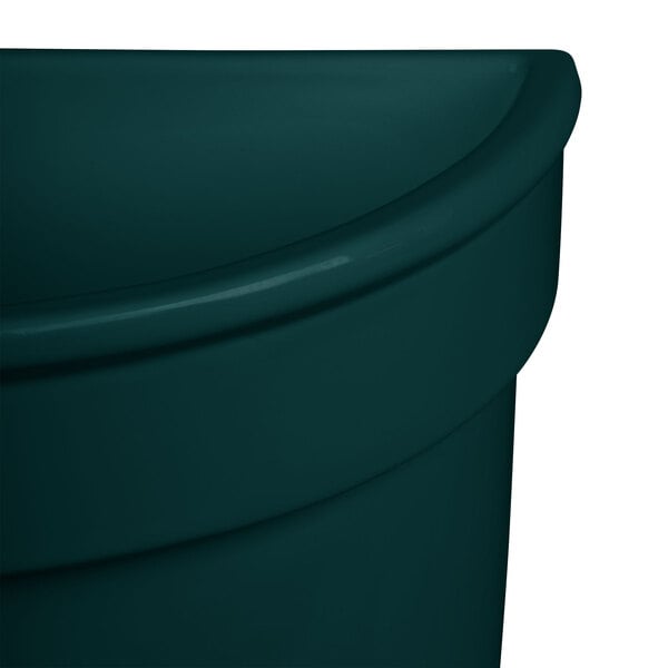 A Tablecraft hunter green cast aluminum soup bowl with a lid.