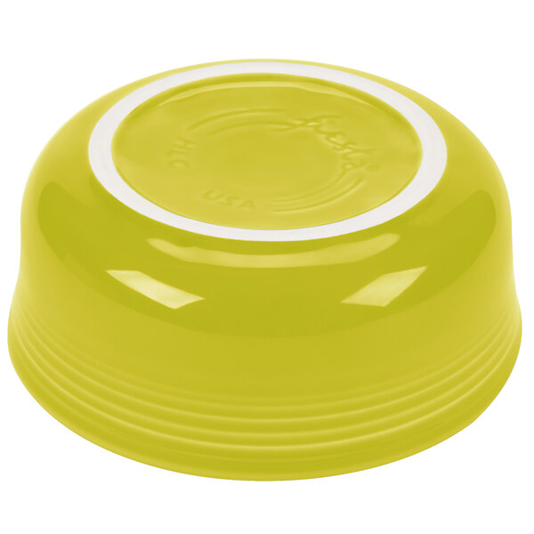 A yellow bowl with a white rim.