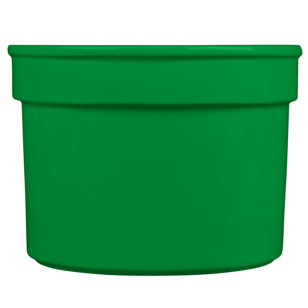 A green cast aluminum half soup bowl with a white background.