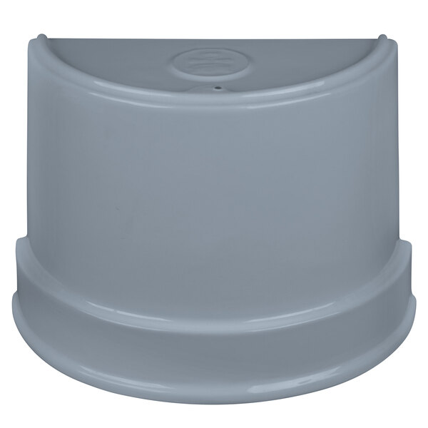 A gray cast aluminum bowl with a white interior and round ripples.