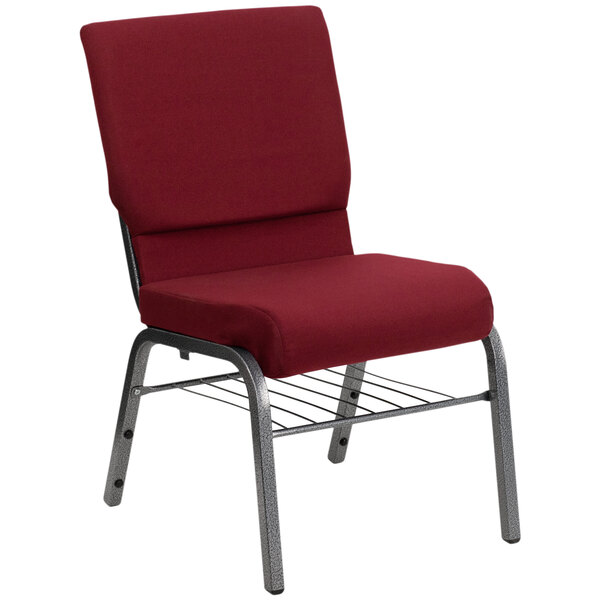 A burgundy church chair with a silver metal frame.