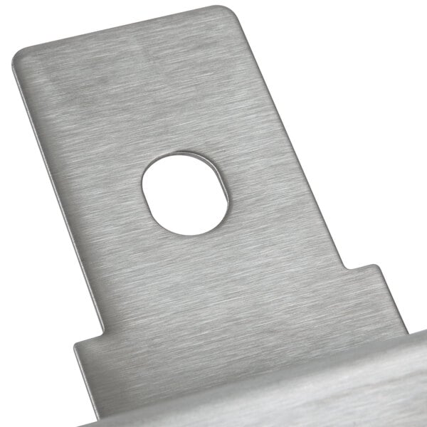 A stainless steel Grindmaster Cecilware non-contact handle with a hole in the center.