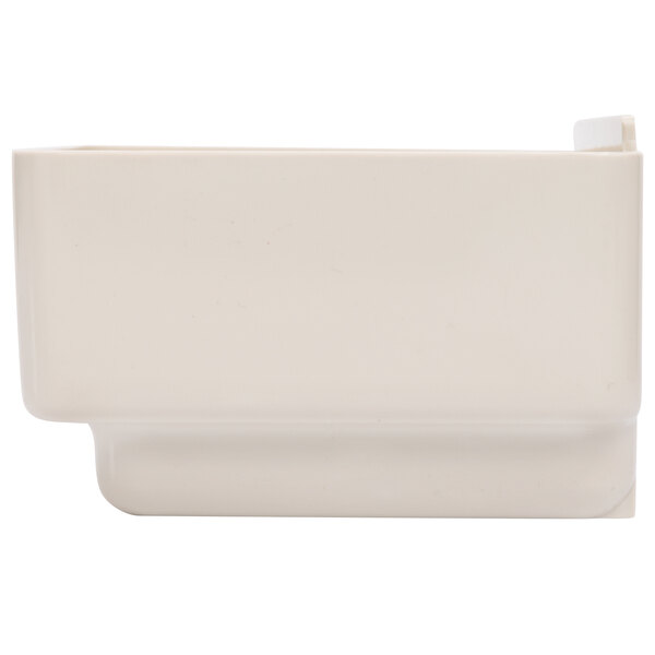 A white rectangular plastic drip tray with a lid.