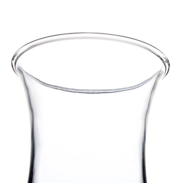 A clear plastic Thunder Group hurricane glass.