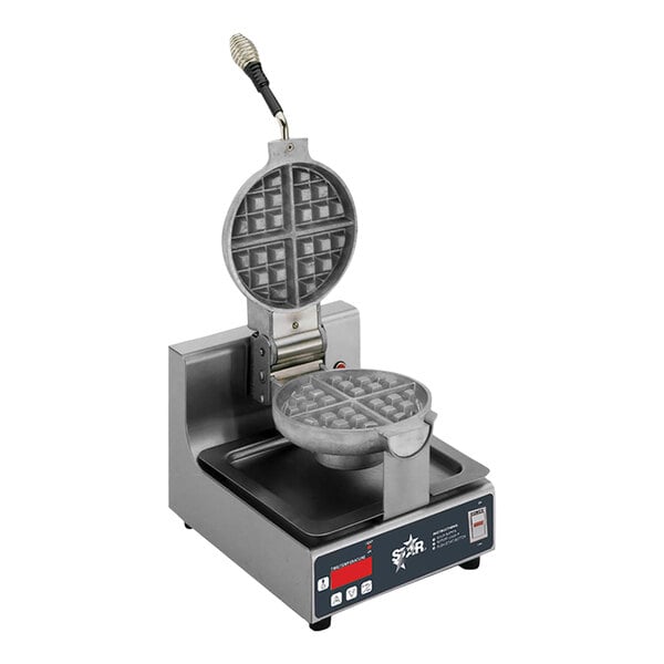 A Star Belgian waffle iron with a lid on a counter.