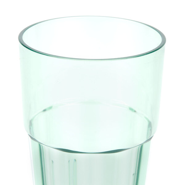 A green polycarbonate tumbler with a clear rim.
