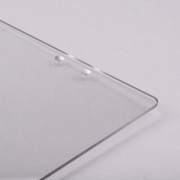 A clear plastic door kit with two small holes for a Paragon Simply-A-Blast Snow Cone Machine.