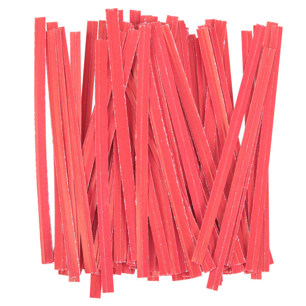 A pile of red plastic printed cotton candy bags.