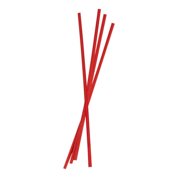 Several red, thin, straight sticks are arranged in a loose bundle against a white background.