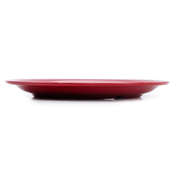 A red GET Red Sensation narrow rim plate on a white background.