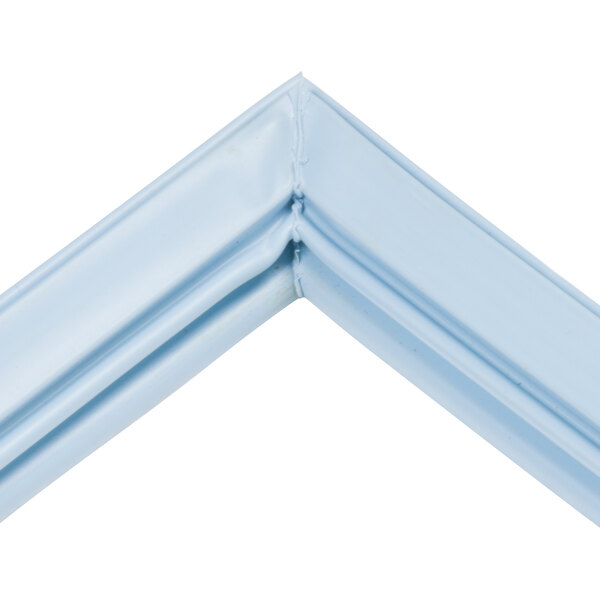 A close-up of a blue corner molding on a white background.