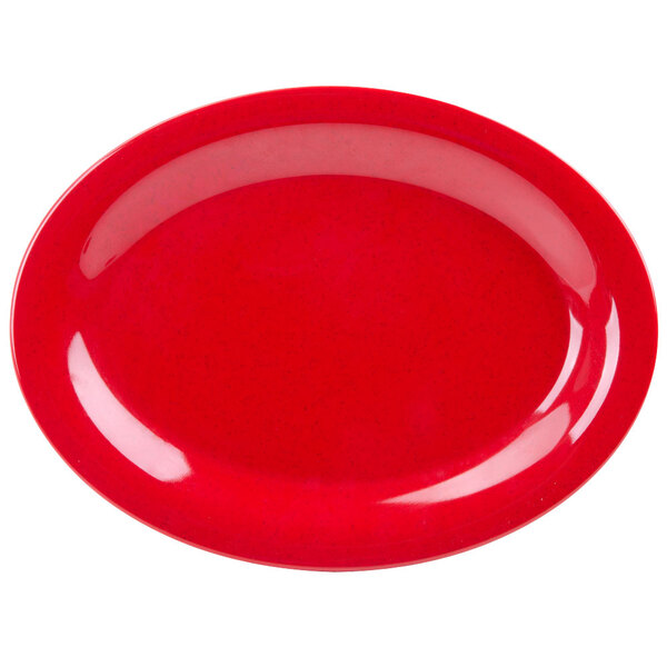 A red oval platter with white speckled specks.