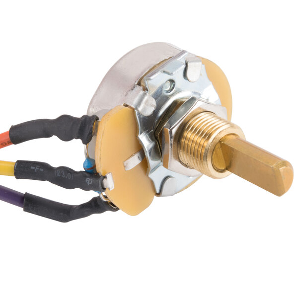A close-up of a Remote Potentiometer with a gold and silver toggle switch and wires.