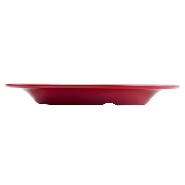 A red GET Red Sensation melamine plate on a table.