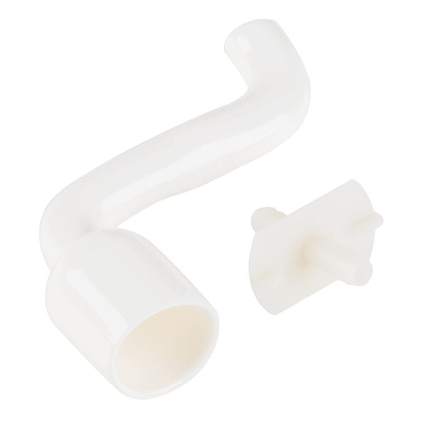 A white plastic pipe with a plastic connector and a hole.