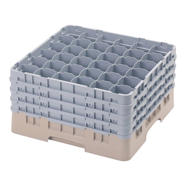 A beige plastic Cambro glass rack with compartments.