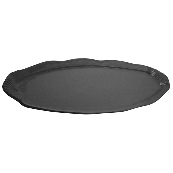 A black rectangular Bon Chef shell and fish platter with a scalloped edge.