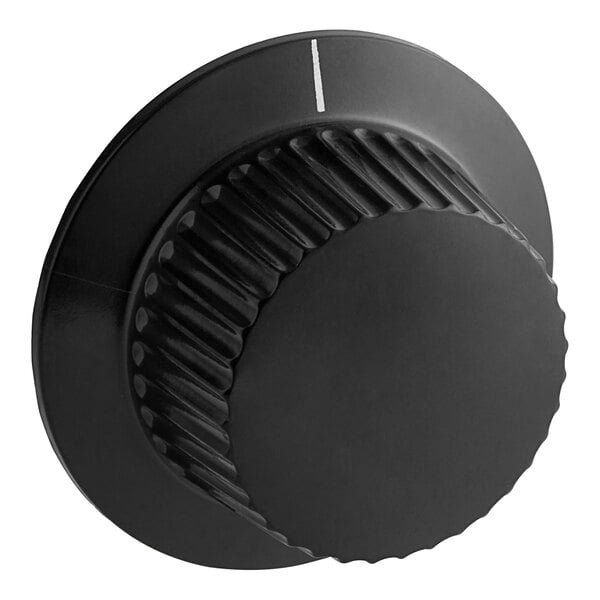 A black knob with a white line.