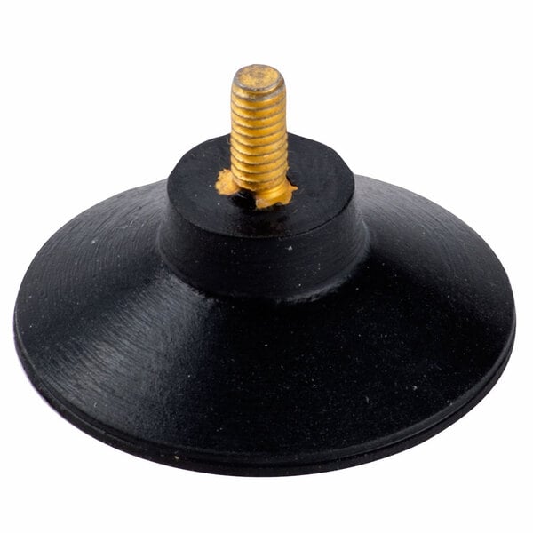 A black plastic object with a gold screw.