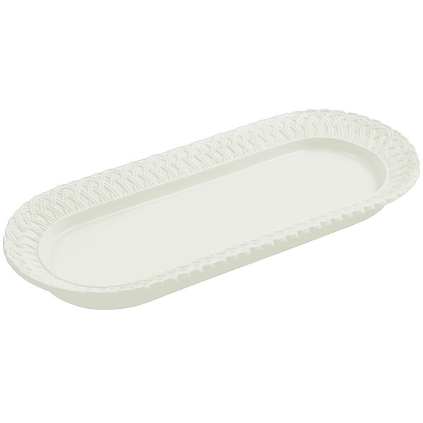 A white oval Bon Chef cast aluminum fish platter with a trellis design.