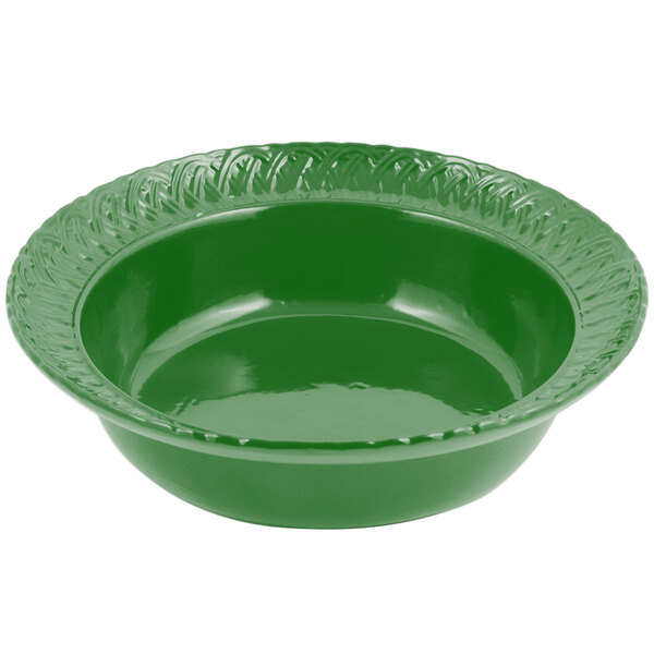 A green Bon Chef cast aluminum bowl with a decorative trellis design.