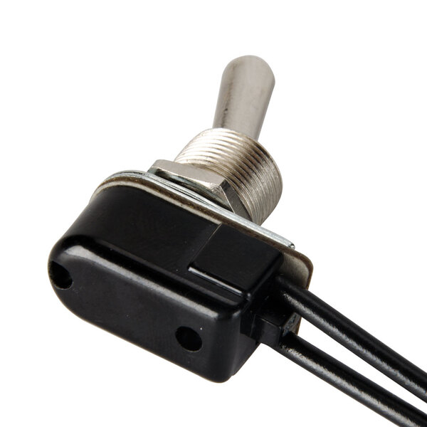 A close-up of a Nemco 120V toggle switch with a wire attached.