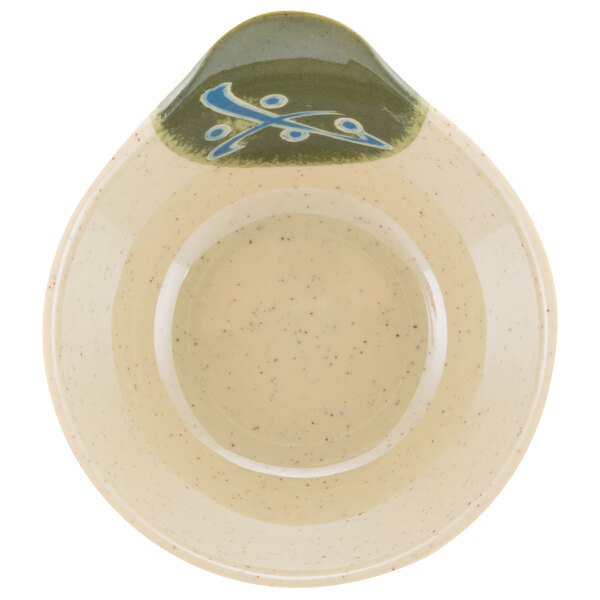 A close-up of a green and blue GET Japanese Traditional bowl with a handle.