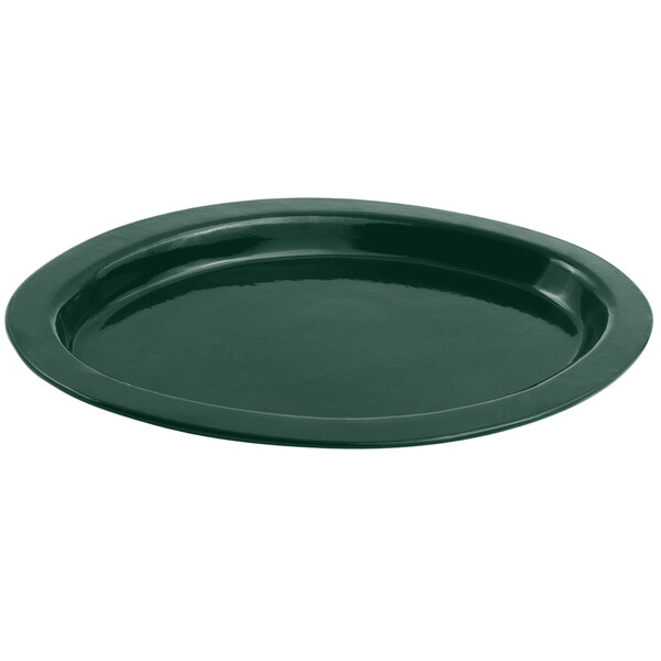 A Bon Chef hunter green cast aluminum oval casserole dish with a green sandstone finish.