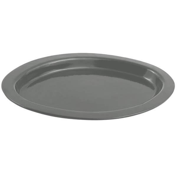 A round gray Bon Chef cast aluminum casserole dish with a sandstone finish.